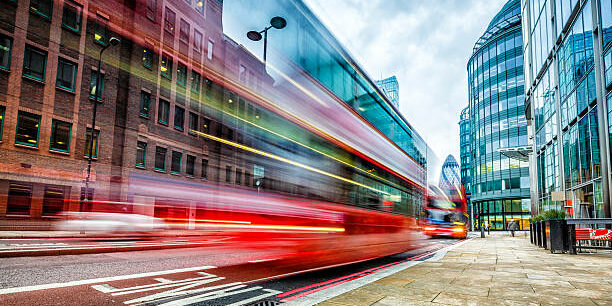 London famous double-decker bus driving along Bishopsgate in London. http://santoriniphoto.com/Template-london.jpg